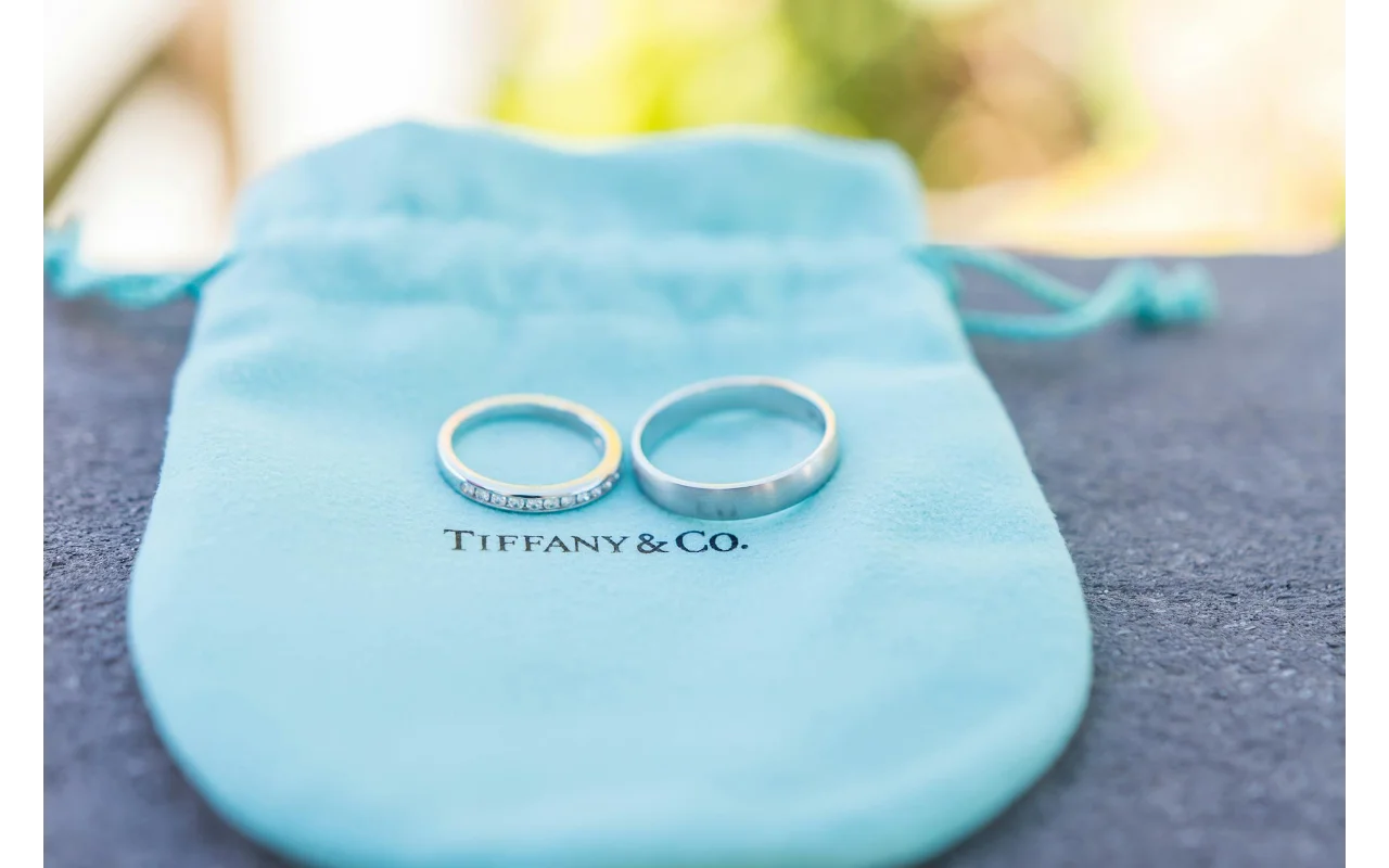 Silver Rings On Tiffany Pouch Representing Strong Luxury Brand Identity